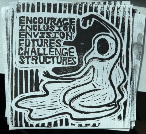 a minimalist black and white linocut print of a sitting woman and the text "ENCOURAGE INCLUSION ENVISION FUTURES CHALLENGE STRUCTURES"
